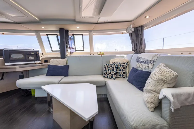 Slide: The Image of Luxurious interior of 2020 Fountaine Pajot Saona 47 catamaran with modern seating and decor. - 48