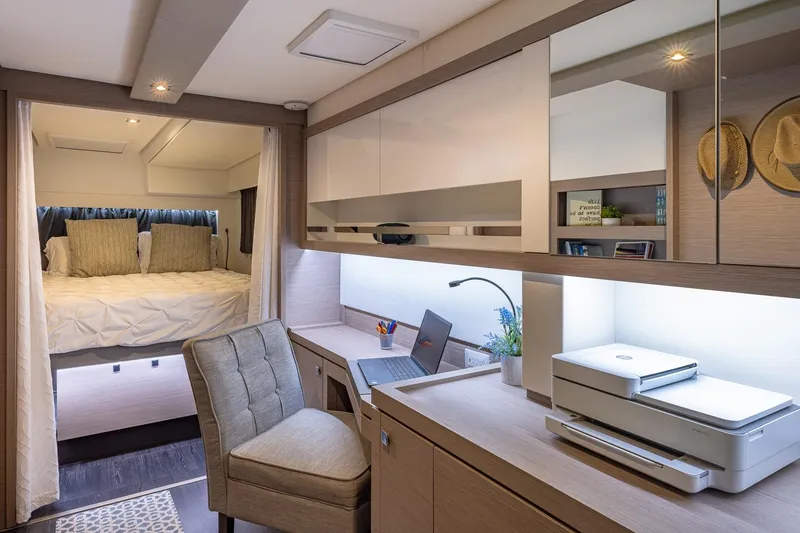 Slide: The Image of Luxurious interior of 2020 Fountaine Pajot Saona 47 yacht with cozy bedroom and modern workspace. - 55