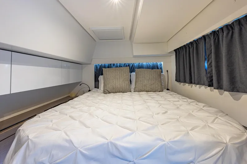 Slide: The Image of Luxurious bedroom interior of 2020 Fountaine Pajot Saona 47 yacht with elegant bedding. - 57
