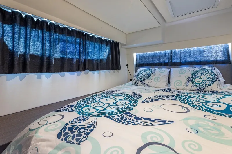 Slide: The Image of Luxurious cabin interior of 2020 Fountaine Pajot Saona 47 with turtle-themed bedding. - 66