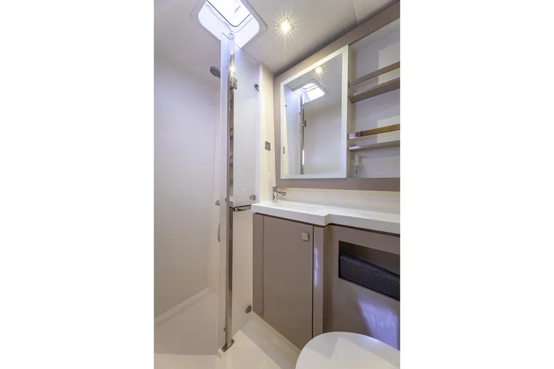 Slide: The Image of Modern bathroom interior on 2020 Fountaine Pajot Saona 47 yacht, featuring sleek design and ample lighting. - 67