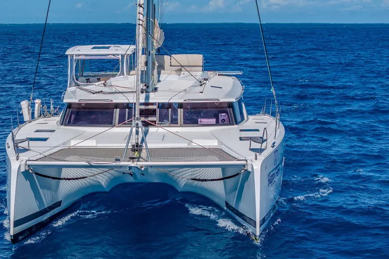 Slide: The Image of 2020 Fountaine Pajot Saona 47 catamaran sailing on open blue sea. - 7