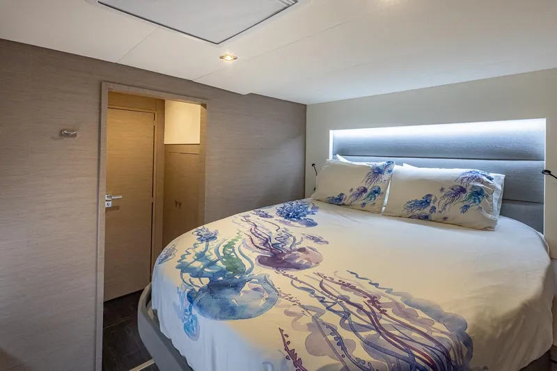 Slide: The Image of Luxurious bedroom interior of 2020 Fountaine Pajot Saona 47 yacht with jellyfish-themed bedding. - 70