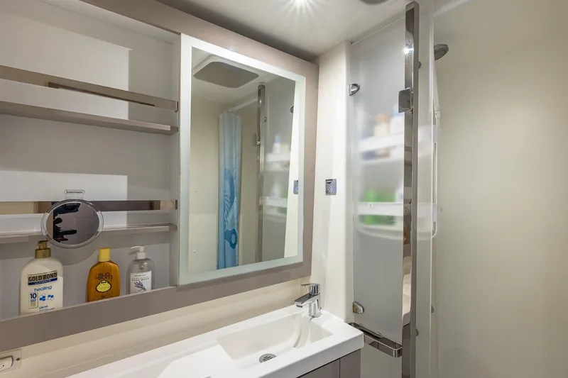 Slide: The Image of Modern bathroom in 2020 Fountaine Pajot Saona 47 yacht with sleek fixtures and storage. - 73
