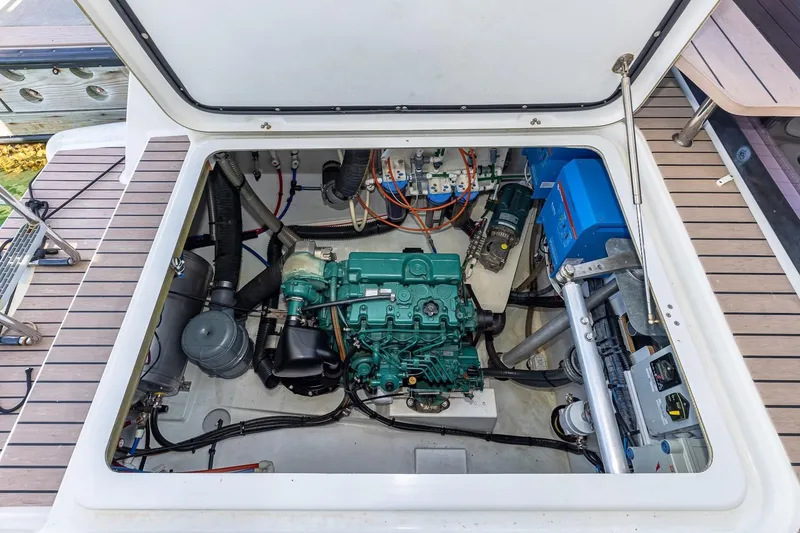 Slide: The Image of Engine compartment of 2020 Fountaine Pajot Saona 47 catamaran, showcasing mechanical components. - 79