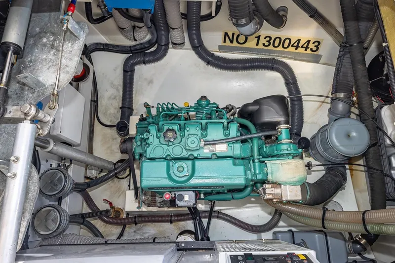 Slide: The Image of Engine room of 2020 Fountaine Pajot Saona 47 catamaran, showcasing mechanical components and wiring. - 82