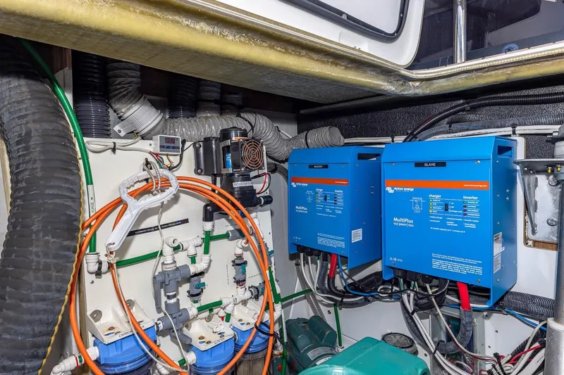 Slide: The Image of Engine room of 2020 Fountaine Pajot Saona 47 with electrical and plumbing systems. - 85