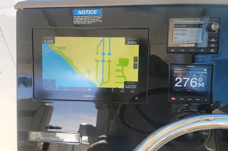 Slide: The Image of Dashboard of 2021 Pursuit DC 326 Dual Console with Garmin navigation system. - 5