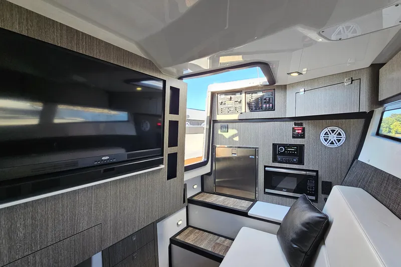 Slide: The Image of Interior of 2022 Monterey 378SS Super Sport boat with modern amenities and sleek design. - 26