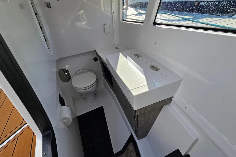 Slide: The Image of 2022 Monterey 378SS Super Sport boat bathroom with modern fixtures and sleek design. - 28