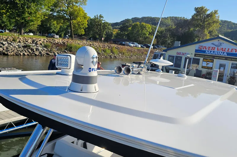 Slide: The Image of 2022 Monterey 378SS Super Sport at River Valley Marina, featuring advanced navigation equipment. - 37