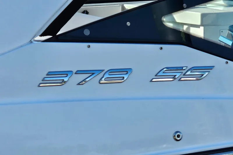 Slide: The Image of 2022 Monterey 378SS Super Sport boat emblem on white exterior. - 38