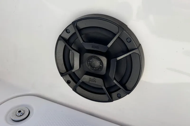 Slide: The Image of Speaker on 2023 Yamaha Boats AR195, featuring a sleek black design. - 22