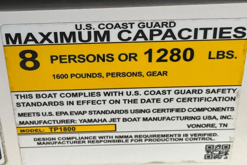 Slide: The Image of 2023 Yamaha Boats AR195 capacity label, 8 persons or 1280 lbs, U.S. Coast Guard compliant. - 30