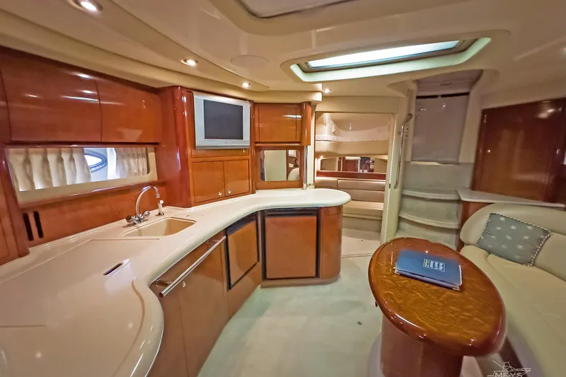 Slide: The Image of Luxurious interior of 2003 Sea Ray 420 Sundancer yacht with modern amenities. - 19