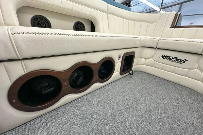 Slide: The Image of Luxurious interior of 2025 StanCraft 260 Day Boat with elegant seating and wood accents. - 14