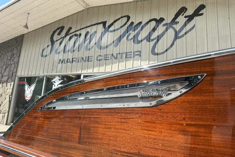 Slide: The Image of 2025 StanCraft 260 Day Boat at StanCraft Marine Center, showcasing elegant wood finish. - 3