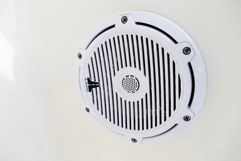 Slide: The Image of White JL Audio speaker on 2026 Pioneer 220 Bay Sport boat. - 12