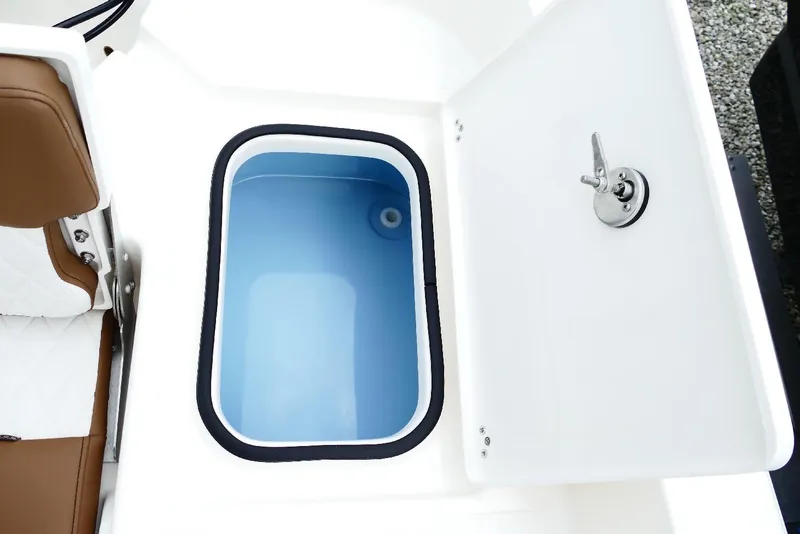 Slide: The Image of Livewell compartment in 2026 Pioneer 220 Bay Sport boat, featuring a sleek design. - 58