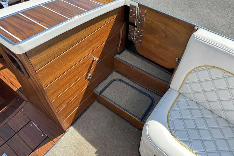 Slide: The Image of Luxurious interior of 2017 StanCraft 320 Rivelle boat with wood and leather details. - 13