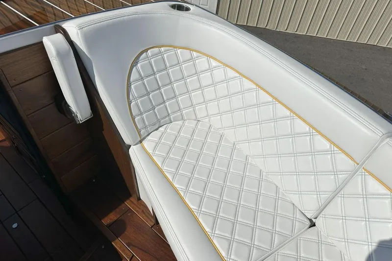 Slide: The Image of Luxurious white leather seating on 2017 StanCraft 320 Rivelle boat, featuring elegant diamond stitching. - 19