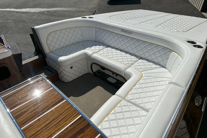 Slide: The Image of Luxurious 2017 StanCraft 320 Rivelle boat interior with white quilted seating. - 9