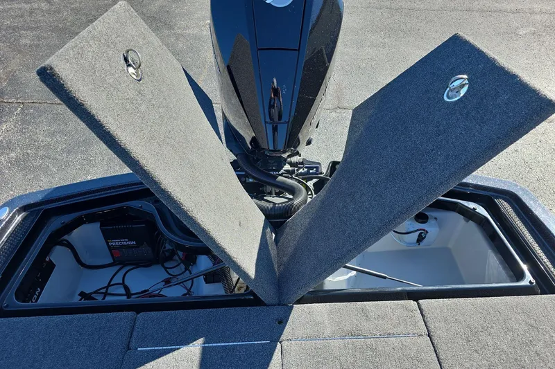 Slide: The Image of Open storage compartments on iKon VLX 21 boat, showcasing interior and equipment, 2025 model. - 12