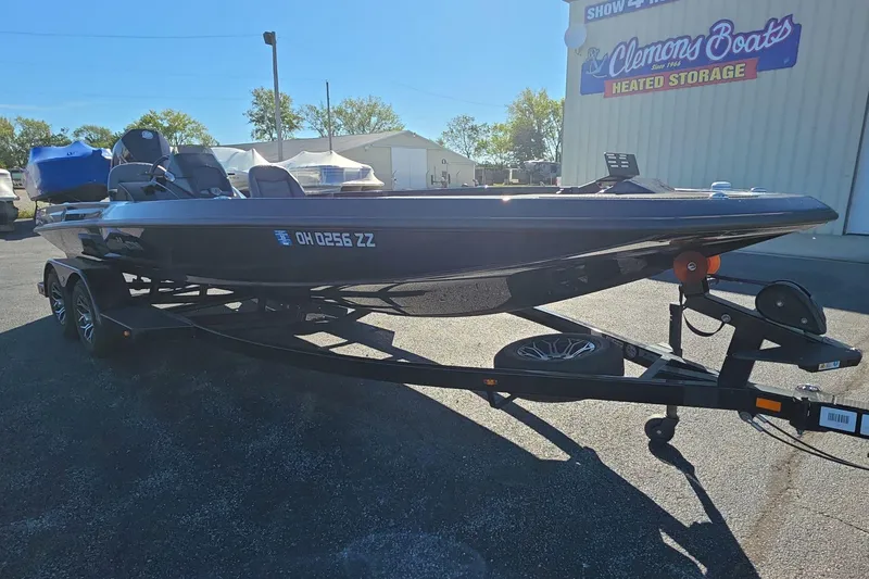 Slide: The Image of 2025 iKon VLX 21 boat on trailer at Clemons Boats storage facility. - 3