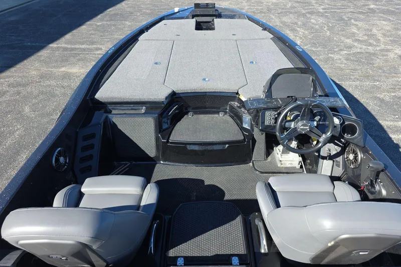 Slide: The Image of 2025 iKon VLX 21 boat interior with modern steering and seating. - 6