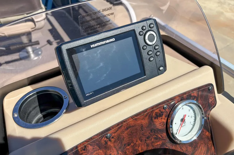 Slide: The Image of 2019 Sun Tracker Bass Buggy 16 DLX dashboard with Humminbird Helix 5 fish finder. - 11