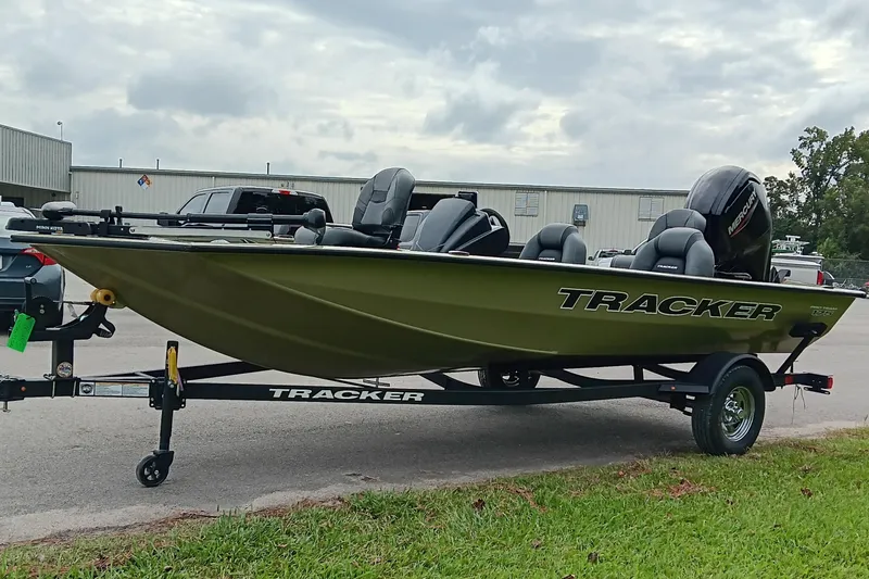 Slide: The Image of 2026 Tracker Pro Team 175 boat on trailer, parked outdoors. - 7