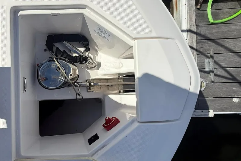 Slide: The Image of 2021 Regal 36 Grande Coupe docked at marina, covered with black tarp. - 12