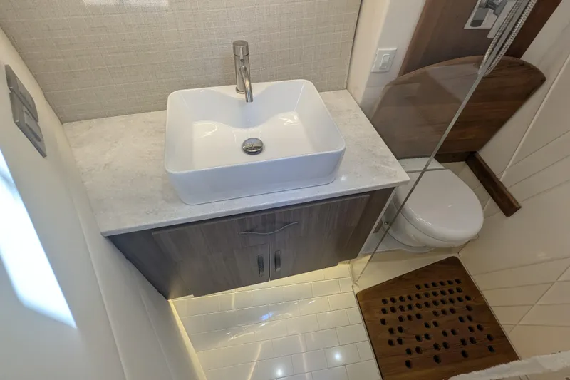 Slide: The Image of 2021 Regal 36 Grande Coupe interior with modern furnishings and cozy sleeping area. - 44