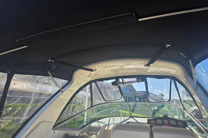 Slide: The Image of Interior view of 2010 Sea Ray 330 Sundancer boat with clear canopy. - 32