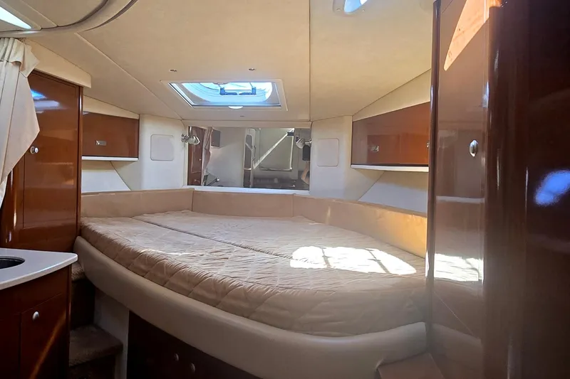 Slide: The Image of Luxurious interior cabin of 2010 Sea Ray 330 Sundancer yacht with skylight. - 44