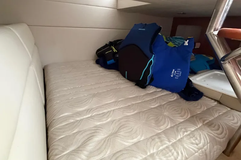 Slide: The Image of 2017 Formula 350 Crossover Bowrider cabin with mattress and life jackets. - 20