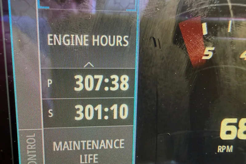 Slide: The Image of 2017 Formula 350 Crossover Bowrider engine hours display showing 307:38 and 301:10. - 27