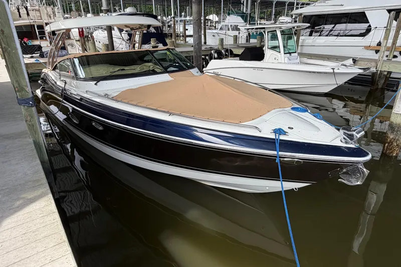 Slide: The Image of 2017 Formula 350 Crossover Bowrider docked at marina, covered and secured. - 4
