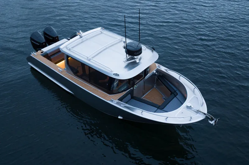 The Image of 2026 Jasper Marine Defender 22 boat on water, featuring sleek design and dual engines. - 0