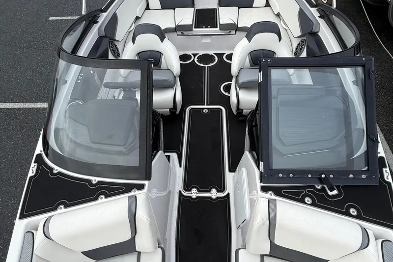 Slide: The Image of 2019 Scarab 195G boat interior with sleek seating and modern design. - 7