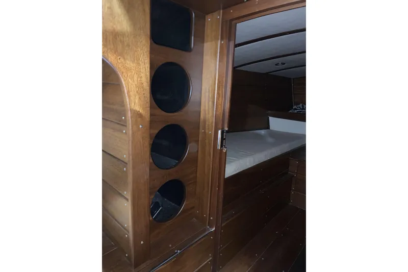 Slide: The Image of 2008 StanCraft 32 Deluxe boat with polished wooden deck and classic design. - 10