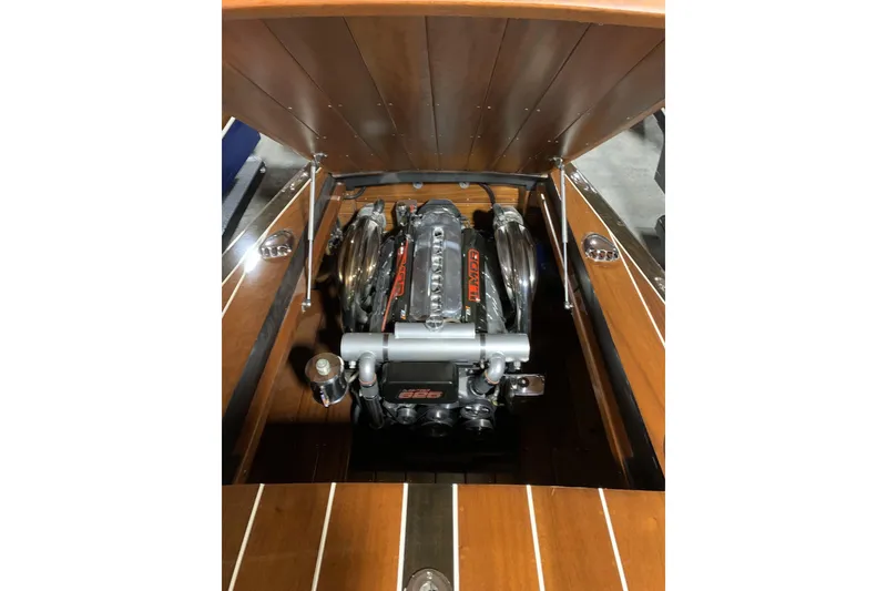 Slide: The Image of Interior cabin of 2008 StanCraft 32 Deluxe boat with wooden finish and seating. - 12