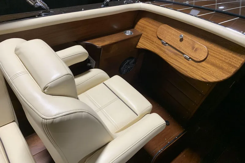 Slide: The Image of Luxurious interior of 2008 StanCraft 32 Deluxe boat with cream leather seating. - 6