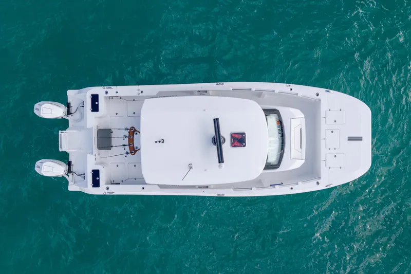 Slide: The Image of Aerial view of 2026 Hammer Yachts 35HH on turquoise water. - 10