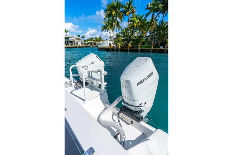 Slide: The Image of 2026 Hammer Yachts 35HH with Mercury outboard engines on tropical water. - 30