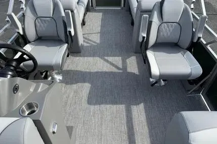 Slide: The Image of 2026 Avalon Venture QL boat interior with gray seating and modern design. - 5