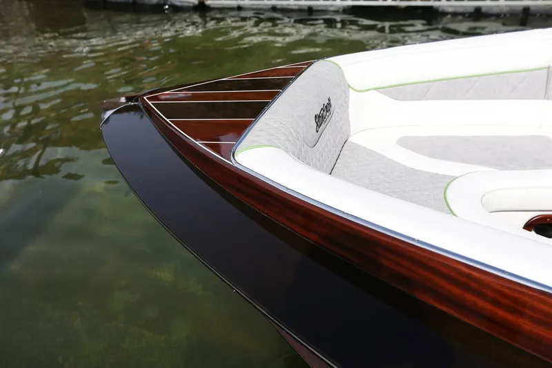 Slide: The Image of Luxurious 2025 StanCraft 290 Rivelle boat with elegant wood finish and plush seating. - 13