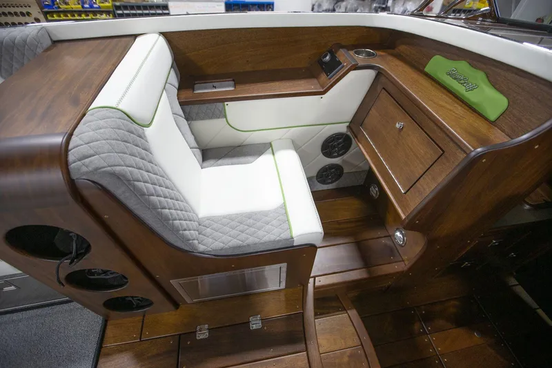 Slide: The Image of Luxurious interior of 2025 StanCraft 290 Rivelle boat with wood and quilted seating. - 16