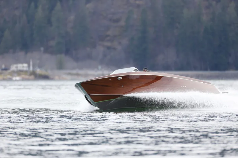 Slide: The Image of 2025 StanCraft 290 Rivelle speedboat cruising on a scenic lake. - 7