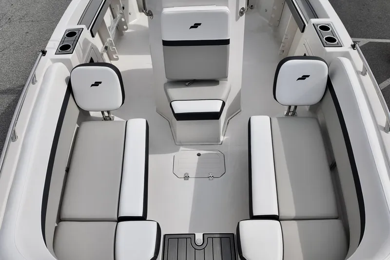 Slide: The Image of 2026 Starcraft SVX 191 OB CC boat interior with white and black seating. - 15